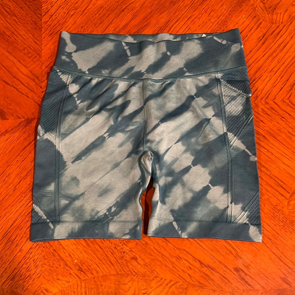 All in motion athletic tight fitting blue tie dye shorts.